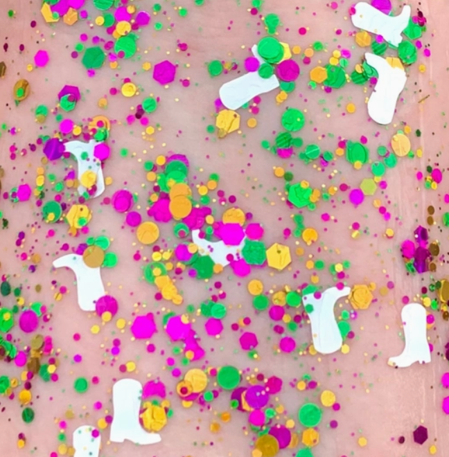 mardi gras confetti white cowboy boots marjorette boots marching band organic body glitter face festive makeup cosmetics sparkly purple green and gold carnival parade
