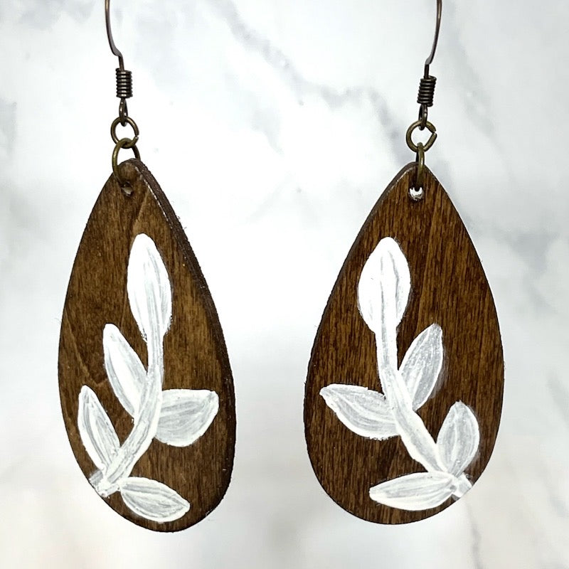 Wood painted tear drop earrings close up