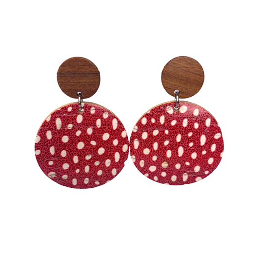 red and white polka dot pattern earrings on cork faux leather and wood