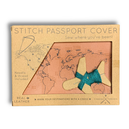 stitch where you've been genuine real leather passport cover brown cognac leather perforated with a world map with needle and thread to cross stitch where you've been travel