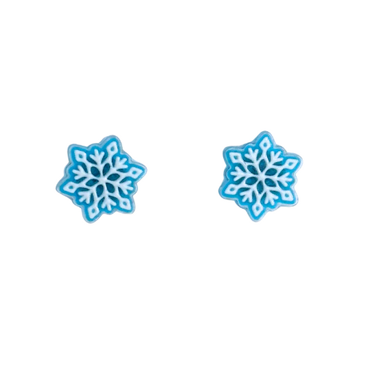 icy blue snowflake stud earrings light blue and white snowflakes winter holiday christmas season merry snow earring fashion style leggings and vino style humor inclusivity