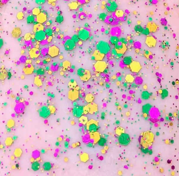 mardi gras confetti sequin glitzy organic body glitter face festive makeup cosmetics sparkly purple green and gold carnival parade