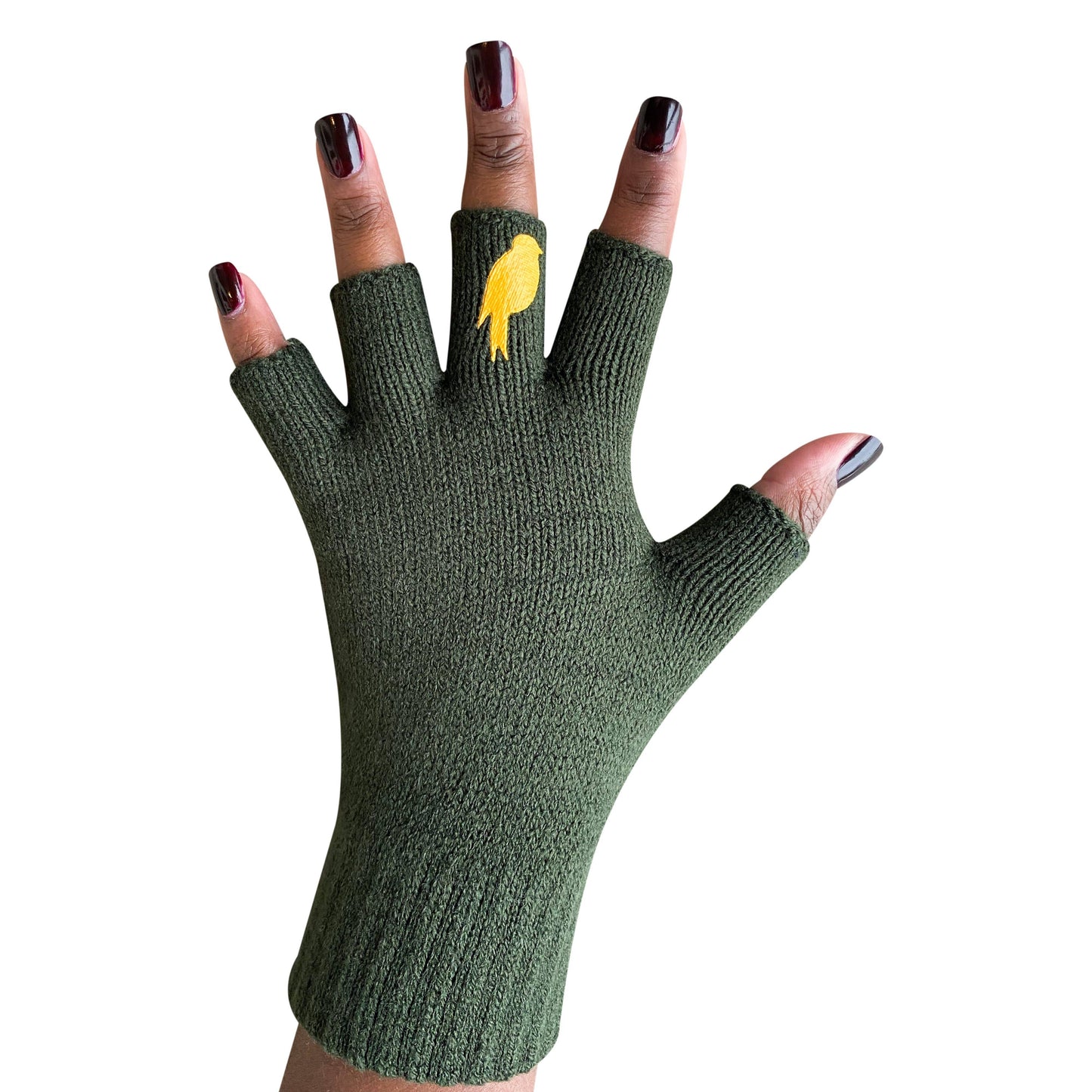 the forest green fingerless gloves with mustard bird on the middle digit shown on a model's hand