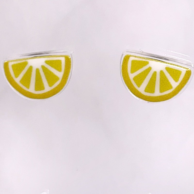 Lemon wedge stud earrings close up