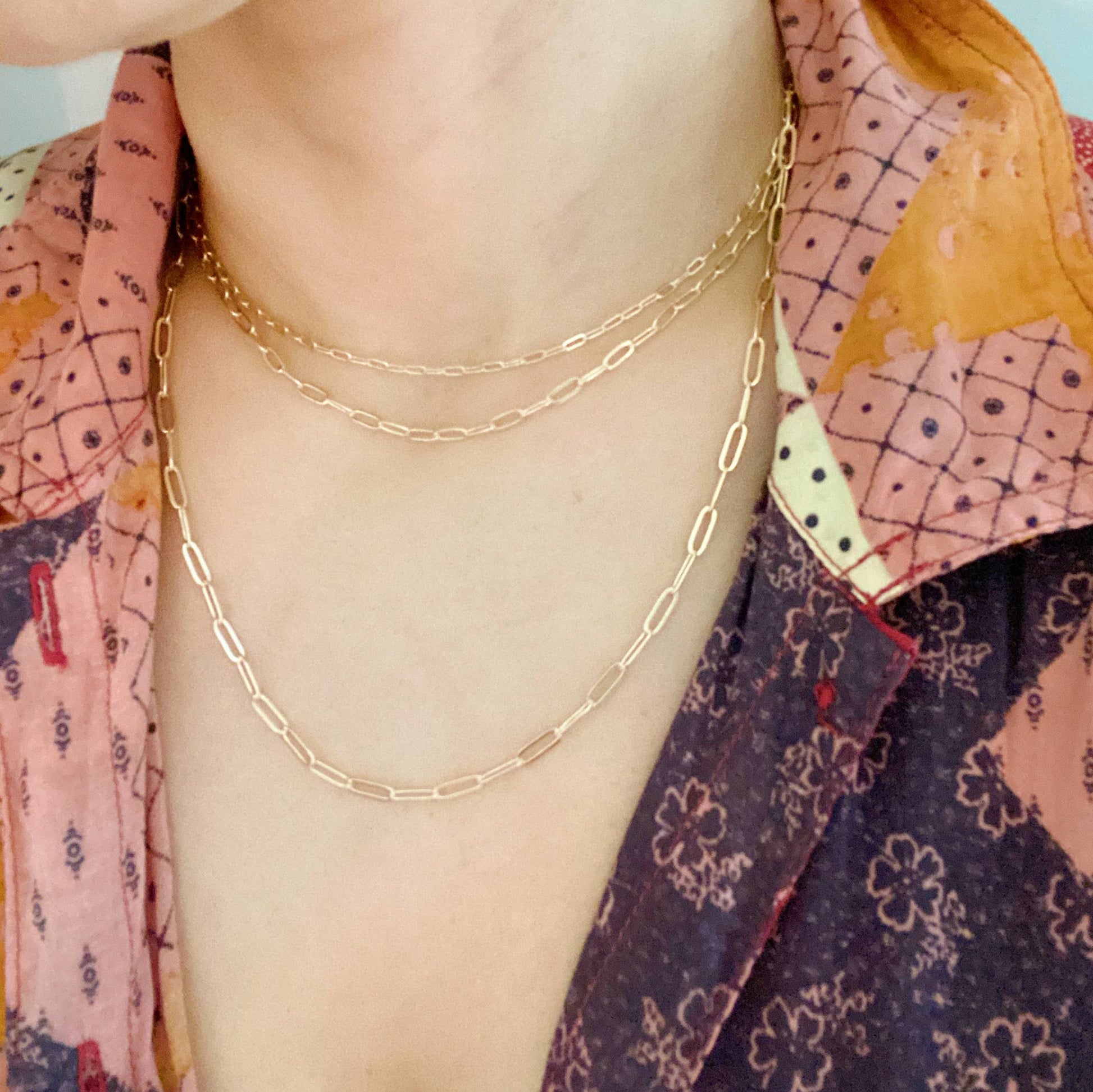 triple-the-fun-layering-chain-link-necklaces-on-model