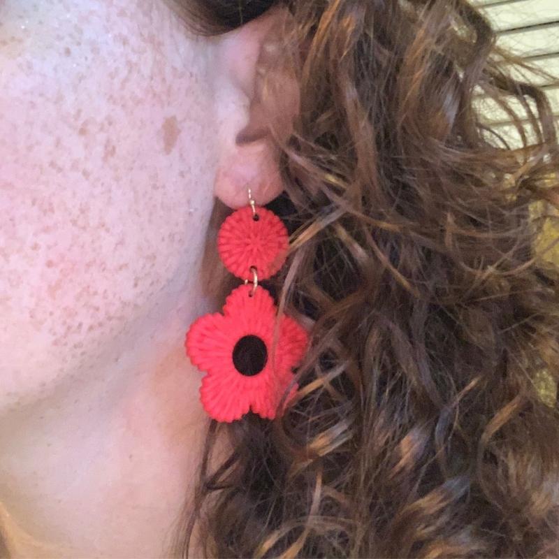 game-day-floral-drop-earrings-in-red-on-model