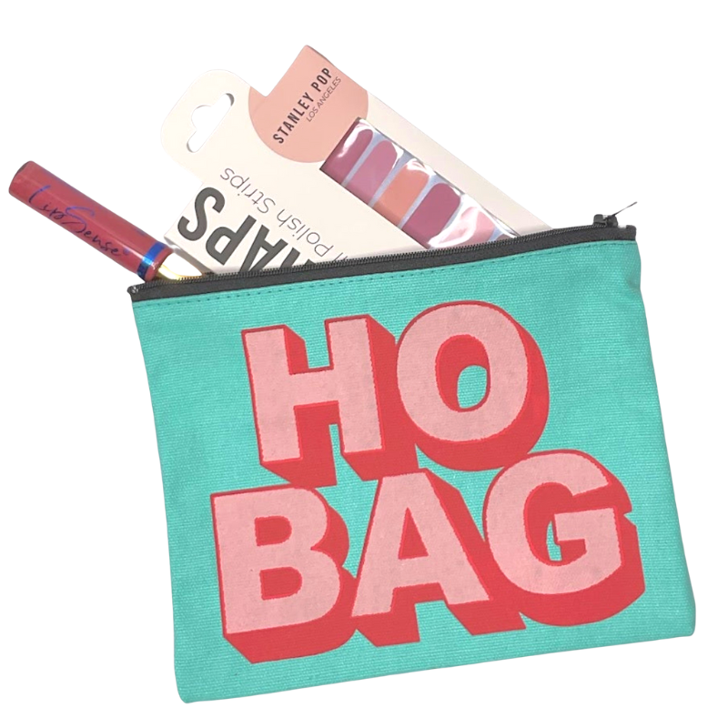 ho bag zipper pouch bright teal canvas zipper pouch with HO BAG design on the front in pink and red displayed with nail wraps and lip gloss