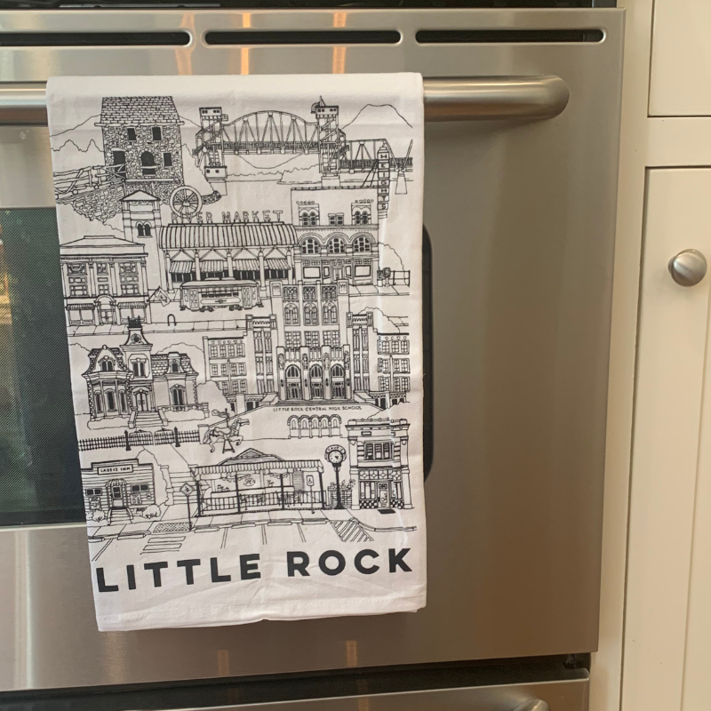 little rock arkansas cotton tea towel with art print of city landmarks and attractions on an oven handle