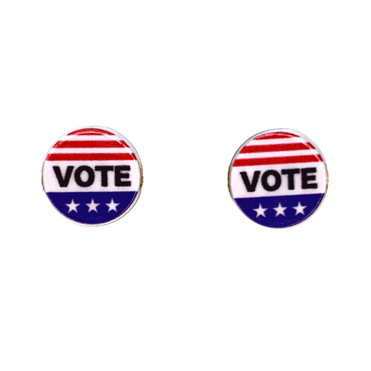 round white circle stud earrings that say VOTE in black with three red stripes on tops and a blue block at the bottom with three white stars going across