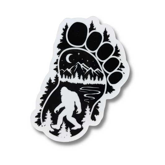 sasquatch bigfoot hiking in nature black and white image inside a bigfoot footprint mountains moon water and trees high quality premium vinyl sticker decal
