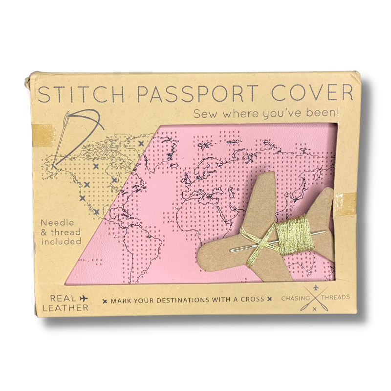 stitch where you've been genuine real leather passport cover light pink leather perforated with a world map with needle and thread to cross stitch where you've been travel